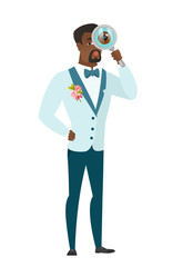 African-american groom with magnifying glass.