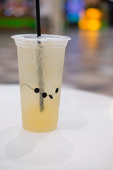 Iced tea in takeaway cup