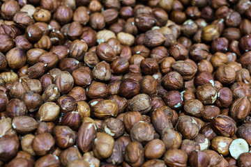 Hazelnuts scattered on the table.