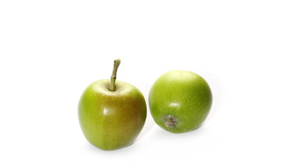 Green young apples isolated on white background