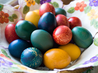 Fototapeta na wymiar Easter Basket with Colored Eggs