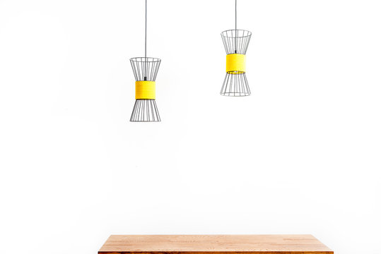 Designer ceiling lamps over desktop