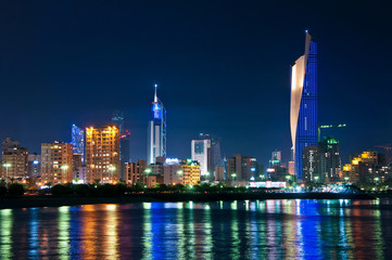 Kuwait City skyline reflected in water