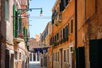 Fototapeta na wymiar Traditional street view of old buildings in Venice, ITALY