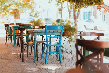 Cafe with different color chairs
