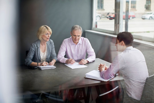 Business people sitting in meeting