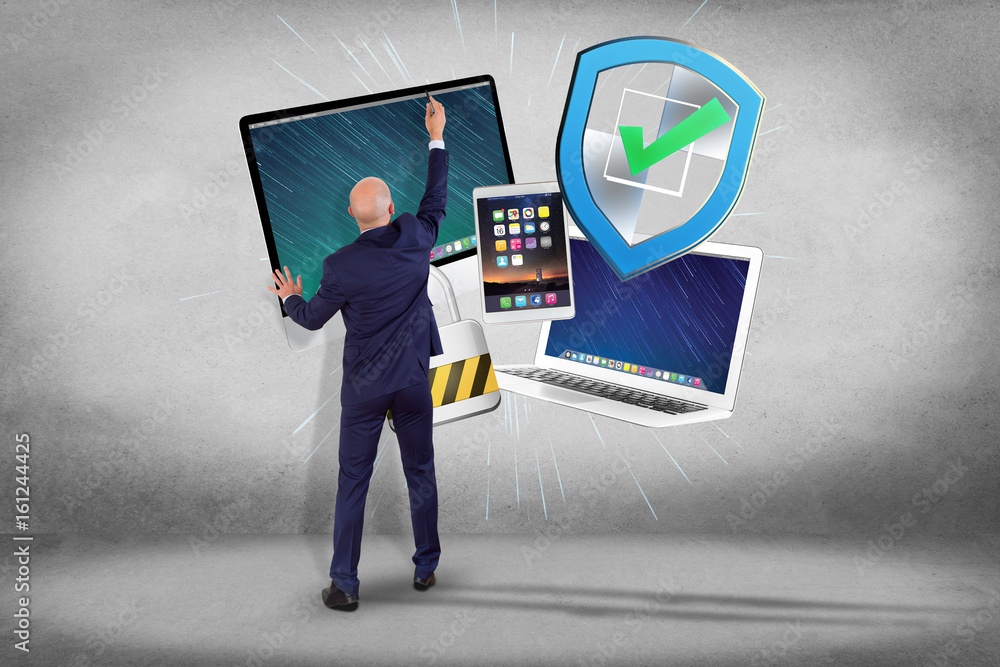 Aufkleber businessman in front of a wall with a shield symbol displayed on a futuristic interface - technology