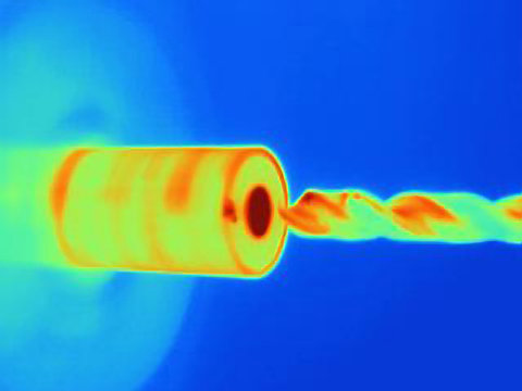 Thermal image of drilling into a component, showing the heat bulidup on the drill bit and the part
