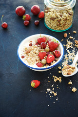 Homemade granola with fresh berries and fruits