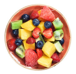 healthy fruit salad isolated on white background. Top view