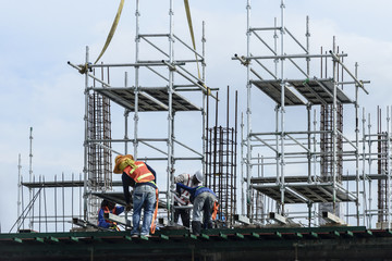 The worker at the construction site .Construction industry concept