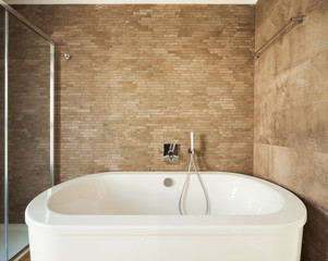 White empty bathtub, new and cleaned