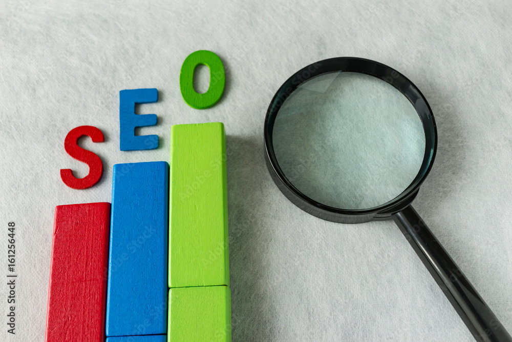 Poster seo search engine optimization concept as colorful wooden block as analysis chart with alphabet abbr