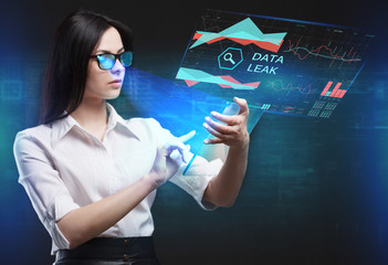 The concept of business, technology, the Internet and the network. A young entrepreneur working on a virtual screen of the future and sees the inscription: Data leak