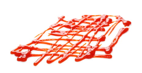 Obraz na płótnie Canvas red ketchup splashes isolated on white background, tomato puree texture
