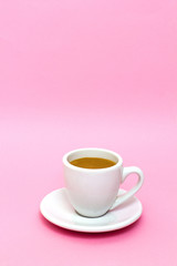 Hot coffee espresso on colorful background.
