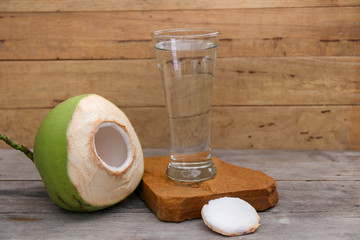 Fresh Coconut Water Drink on wooden  background 