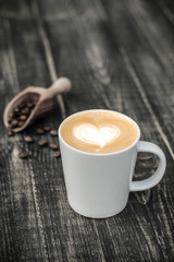 Hot coffee cafe latte on wood table
