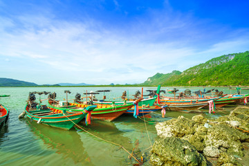 Long Tail Boats on a nice weather day stay in natural dock, southern Thailand