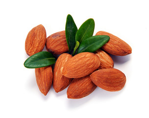 Group of almond nuts with leaves