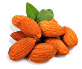 Group of almond nuts with leaves