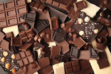 Heap of broken chocolate pieces, close up
