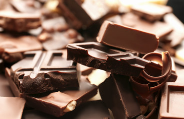 Heap of broken chocolate pieces, close up