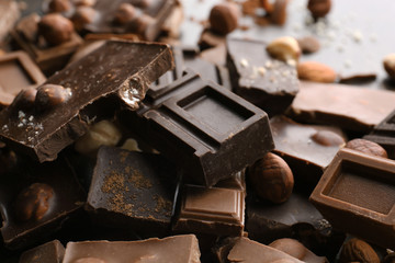 Heap of broken chocolate pieces, close up