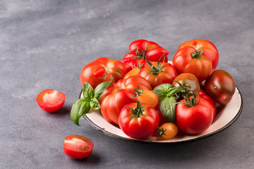 Fresh tomatoes in the foreground with copyspace