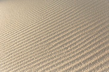 Fototapeta na wymiar Sandy waves, sand on the beach or desert texture pattern