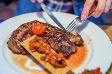 Grilled beef with tomato and bruschetta