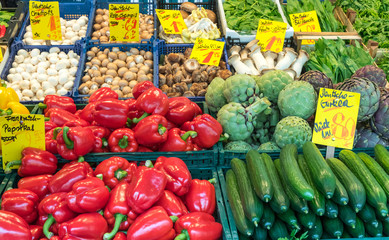 Pepper, gherkin and artichoke for sale at a market