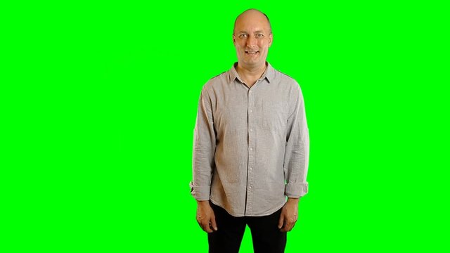 Adult man with big smile gestures greenscreen background. Alpha channel. Advertising template.