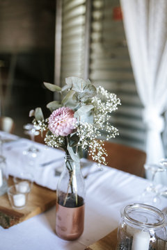 Wedding place setting with flowers bouquet