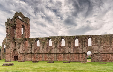 Fototapeta na wymiar The Ancient Ruins of Arbroath Abbey Scotland.