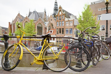 Fototapeta premium Parking place with bicycles for rent on street