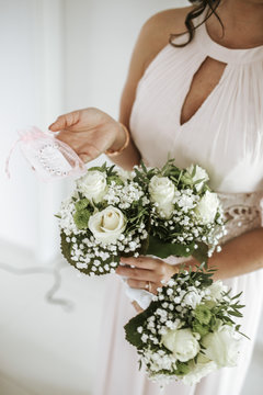 woman holding bouquets