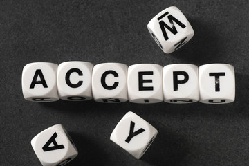 Obraz premium słowo akceptuje na kostkach zabawek