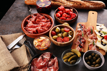 spanish tapas and sangria on wooden table - mediterran antipasti set