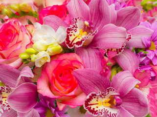 Obraz na płótnie Canvas Floral background of pink roses, orchids. 