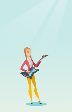 Woman playing the electric guitar.
