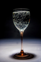 bubbling drink in clear glass 