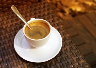 Cup of coffee on a saucer 
