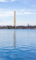 Obraz premium Tidal Basin with Washington Monument reflection and Old Post Office building