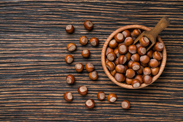 hazelnut on a brown wooden table,top view