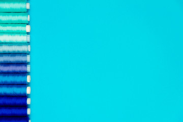 Sewing concept. Colorful sewing spools