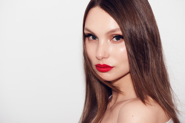 Close-up portrait of beautiful woman with bright make-up