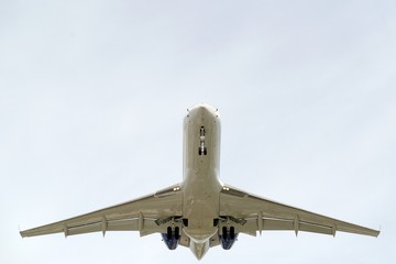 The underside of a modern airplane and its landing gear