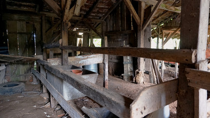 Fototapeta na wymiar Abandoned barn trough