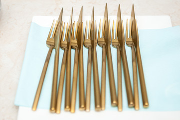Golden knives and forks